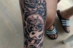 stopwatch arm tattoo