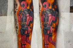 Deadpool leg tattoo