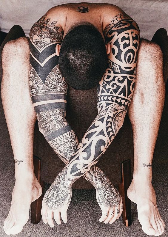 14 Coolest Ideas on Sleeve Tattoos for Men - Tribal Design Sleeve Tattoo