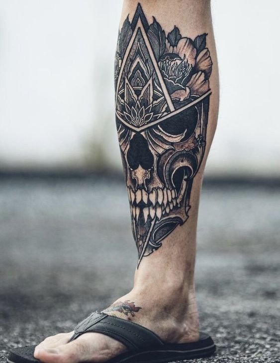 Skull calf tattoo done by Ethan Oberholzer at Dark Arts Tattoo in Midvale  UT  rtattoos