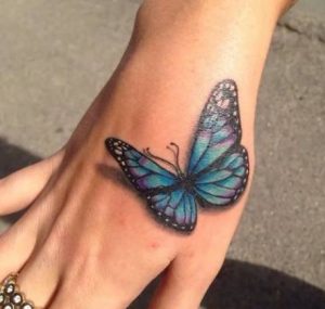 Butterfly Hand Tattoo